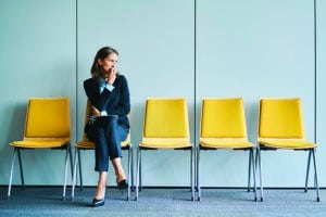 Stressful young woman waiting for job interview