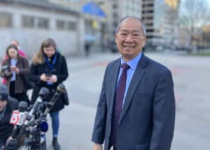 New MBTA General Manager Phillip Eng smiles as he speaks with reporters outside Park Street station on his first day on the job, April 10, 2023. Photo by Chris Lisinski | State House News Service